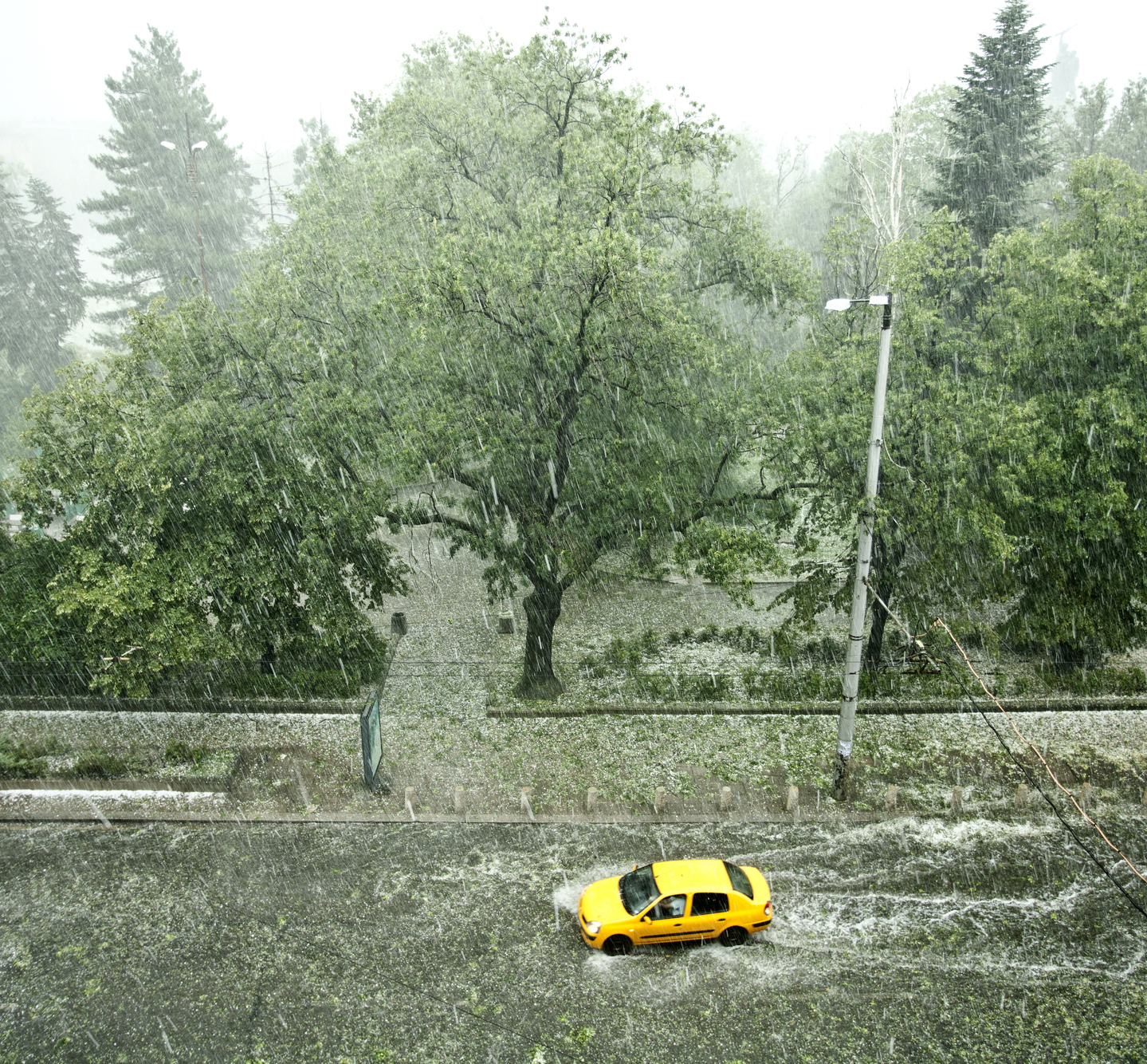 flooded street and car