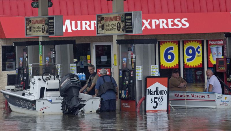 Boats refuel at a gas station