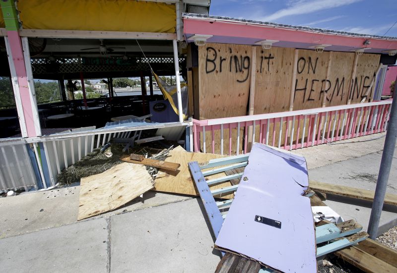 Debris is strewn about in front of the Big Deck bar after Hurricane Hermine passed through