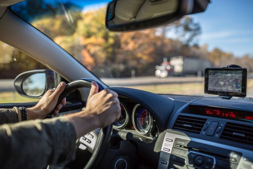 driver behind the wheel of a car