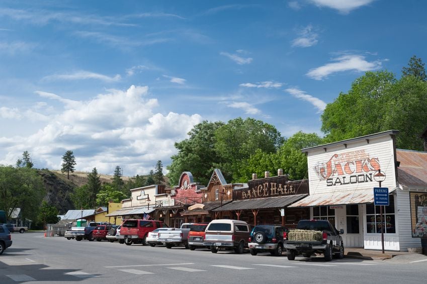 Vehicles lining street of small town