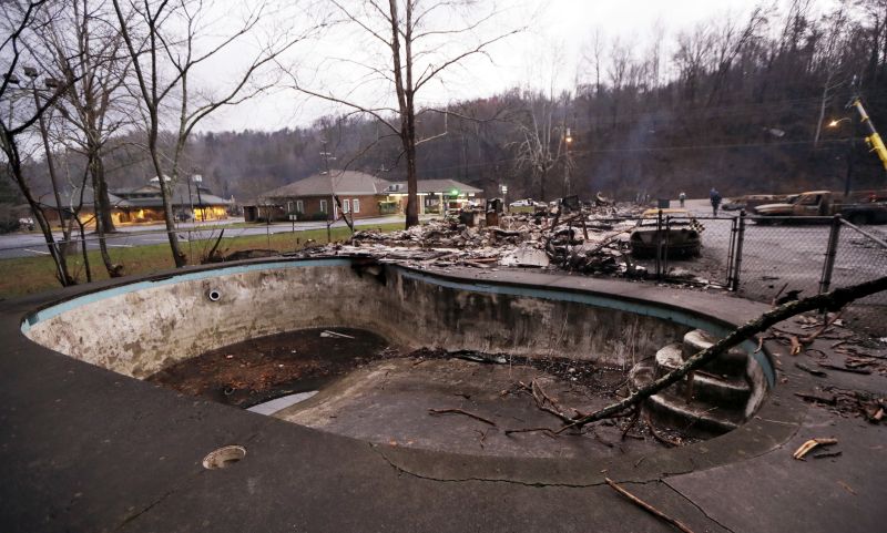 A swimming pool in a motel complex shows burn marks