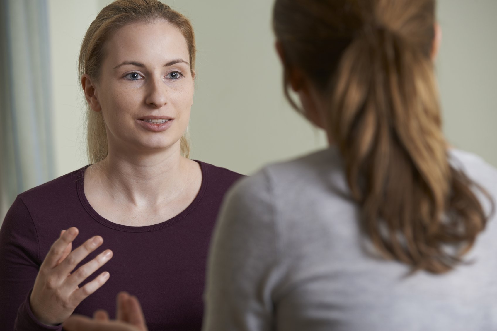 two women talking