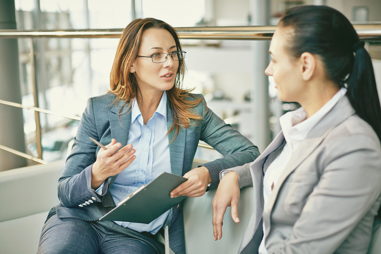 two women interviewing each other