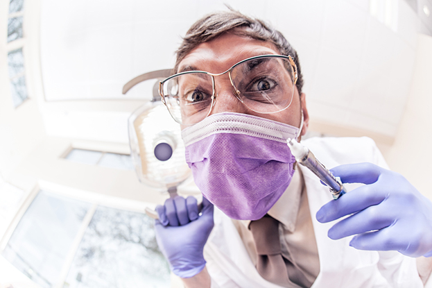 Crazy dentist with syringe