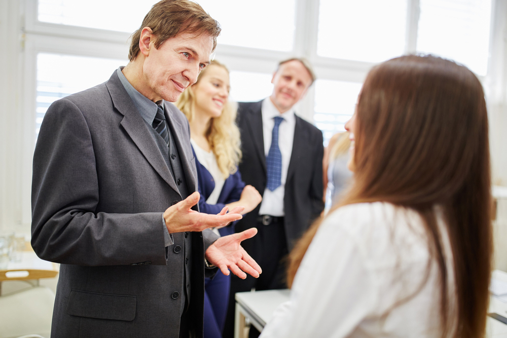 Man standing and talking