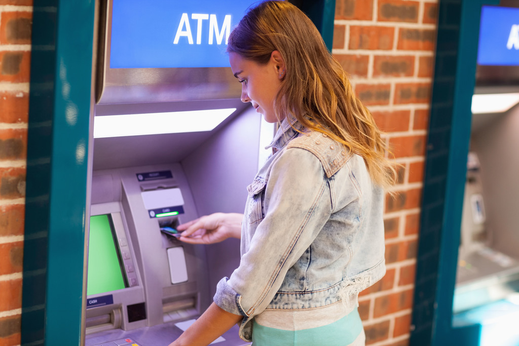 woman at an ATM