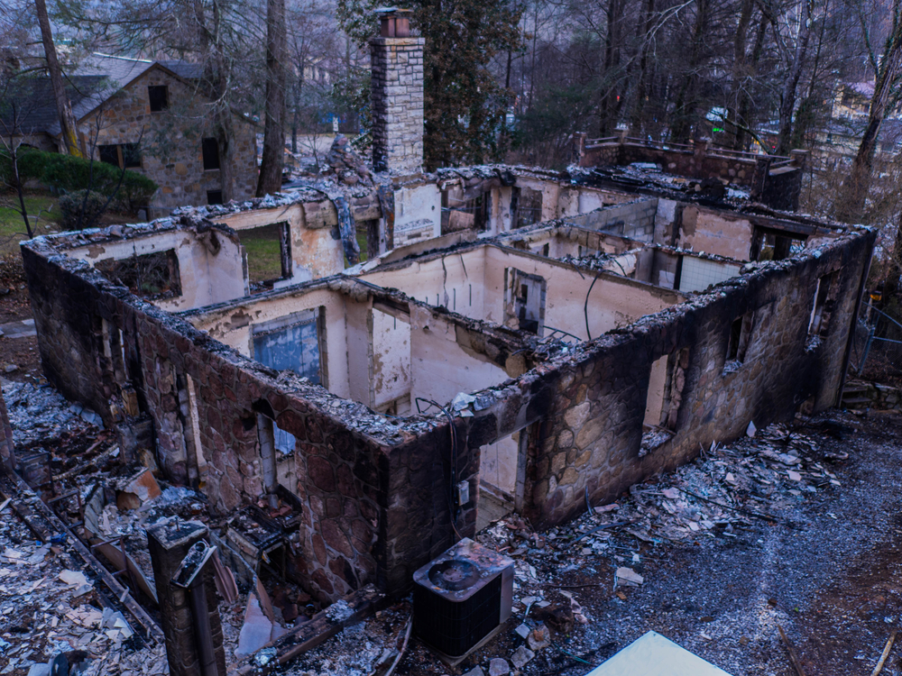 home damaged by wildfire in Tennessee