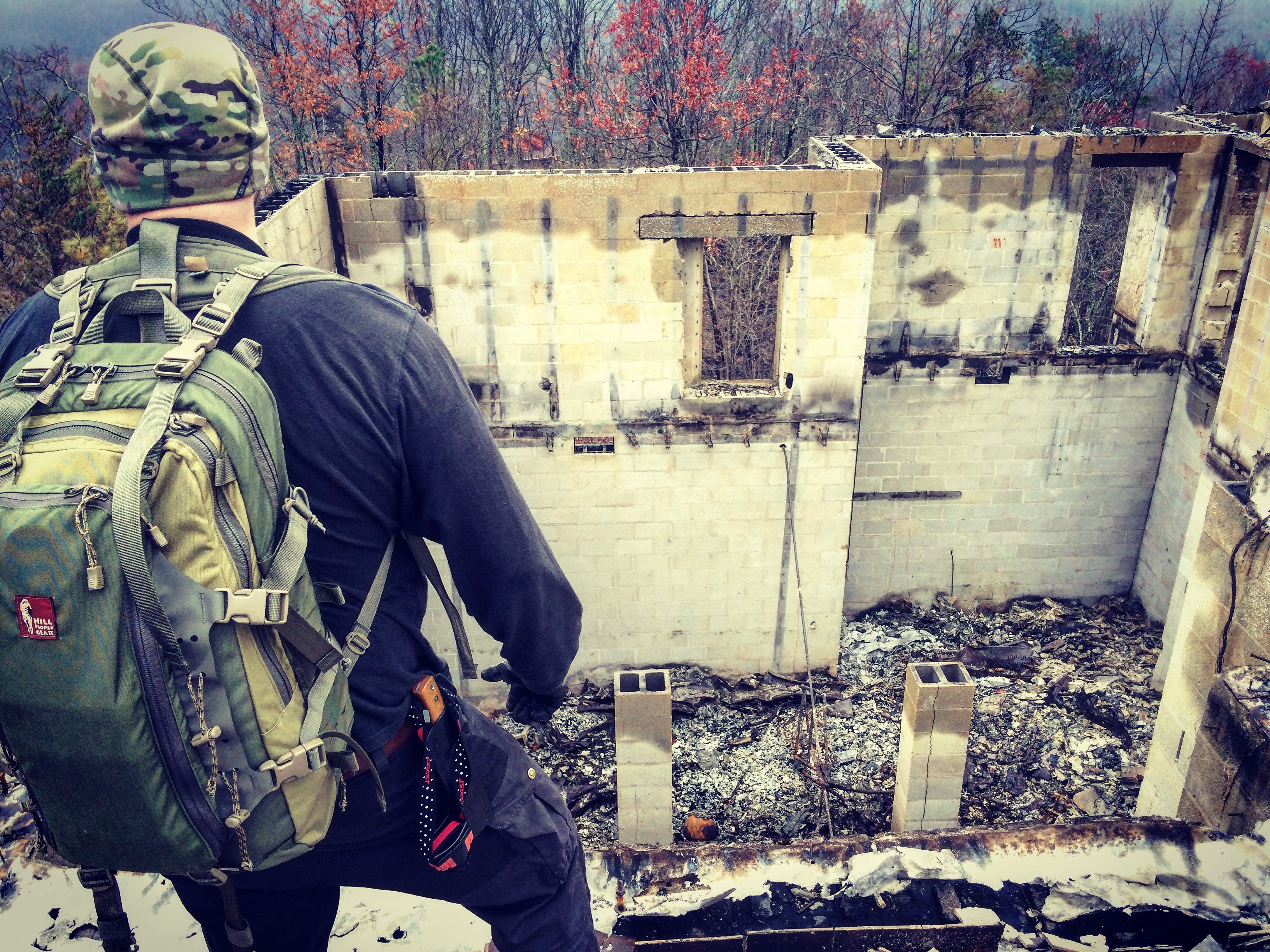 Man surveying wildfire damage in Gatlinburg