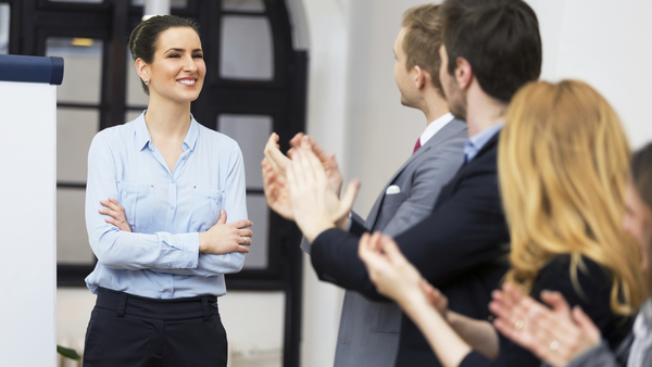 Woman receiving applause