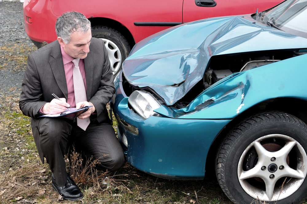 Insurance adjuster adjusting a claim