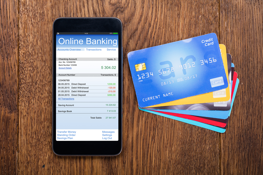 Online banking on smartphone with credit cards