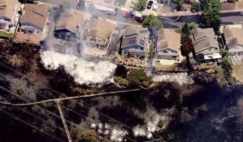 wildifre burns on a hillside close to home in Vallejo, Calif