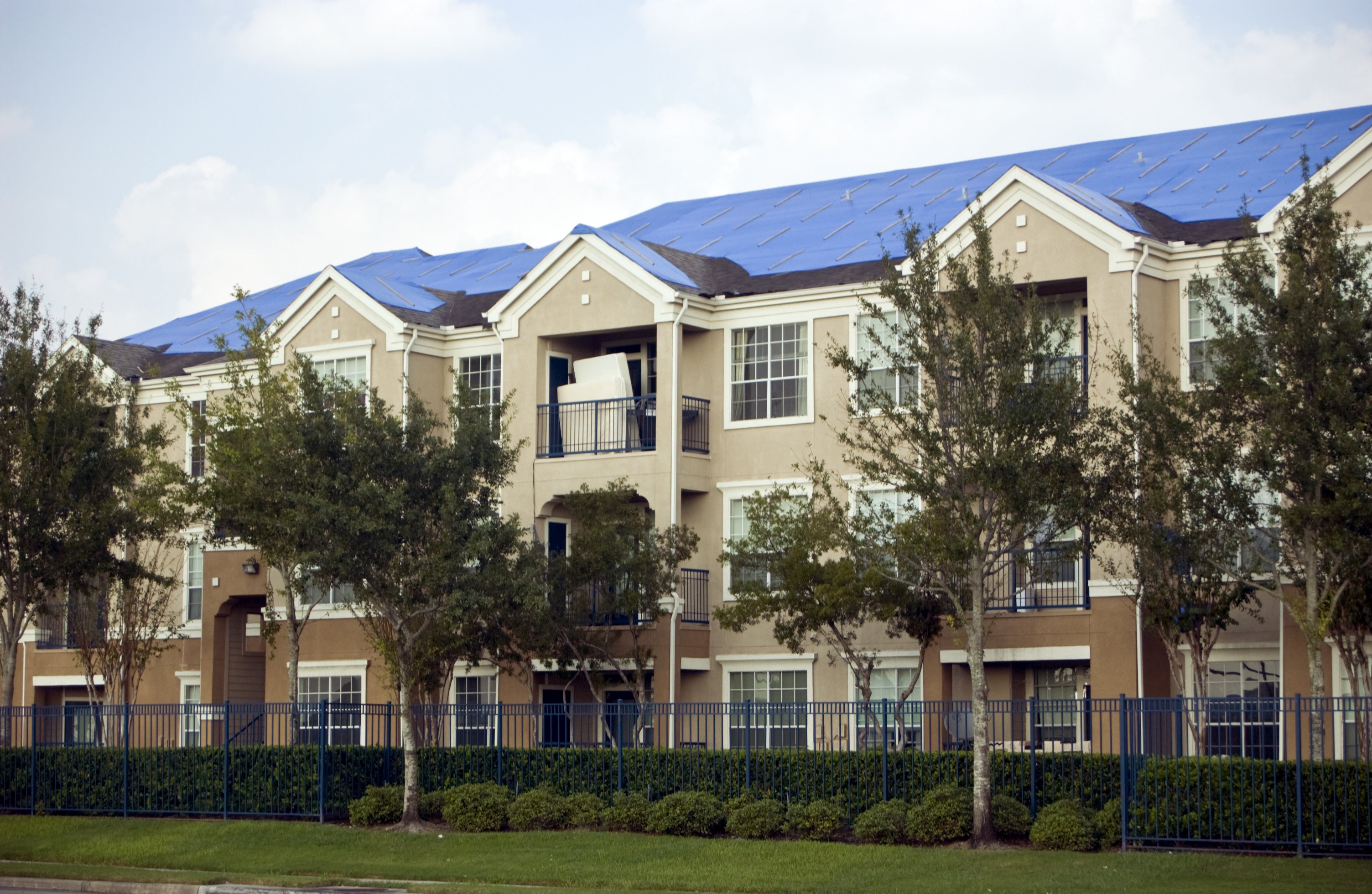 tarped apartment roof