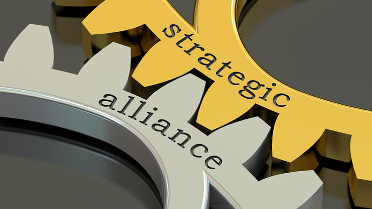 Interlocking gears with the words strategic alliance