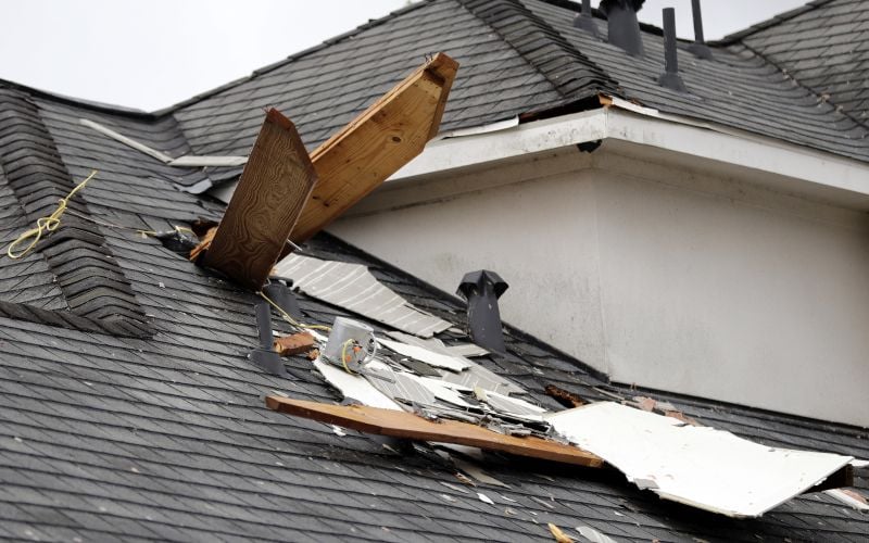 A damaged roof is shown after a tornado from Hurricane Harvey Saturday, Aug. 26, 2017, in Missouri City, Texas.