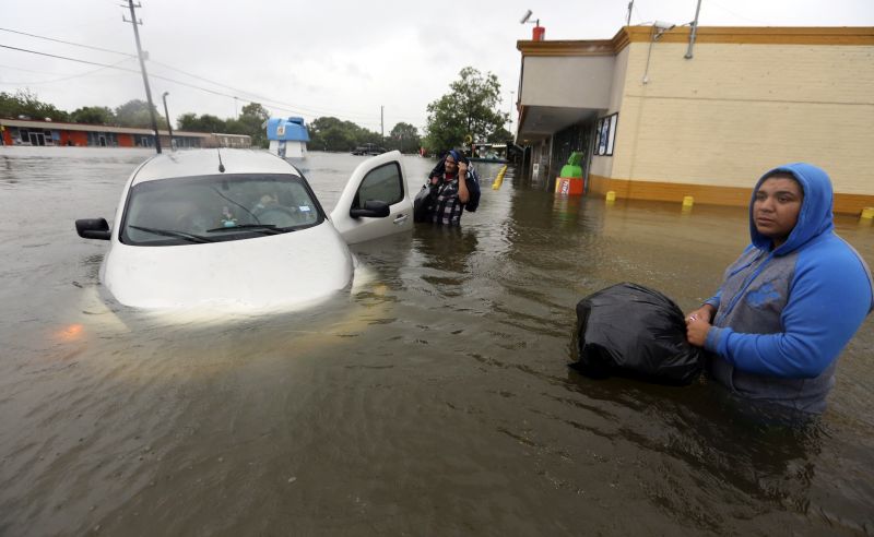 r became stuck in rising floodwaters from Tropical Storm Harvey in Houston, Texas