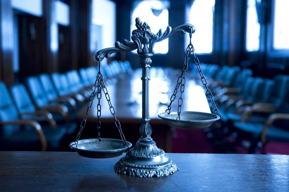 Scales of justice in a court room