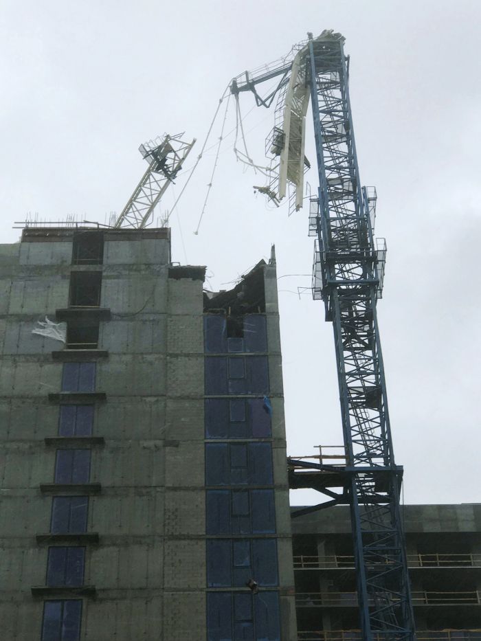 A crane atop a high-rise under construction in downtown Miami collapsed 