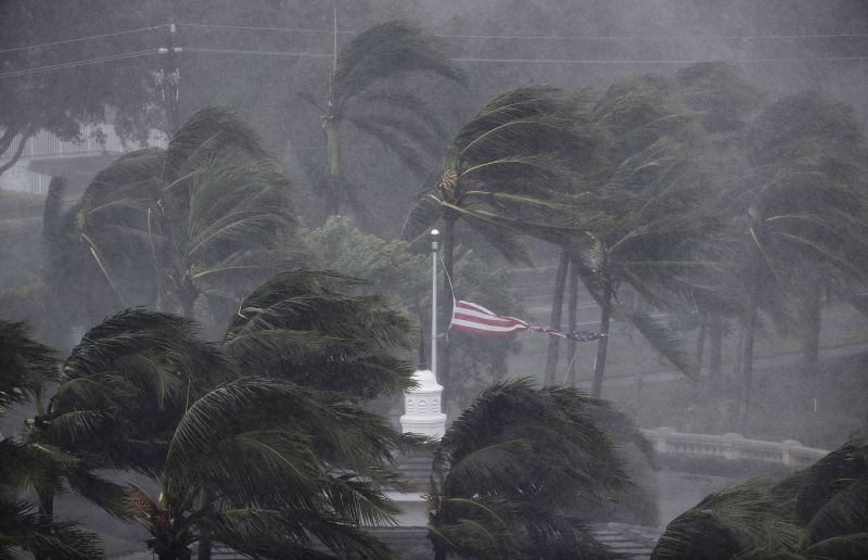 An American flag is torn as Hurricane Irma passes through Naples, Fla.