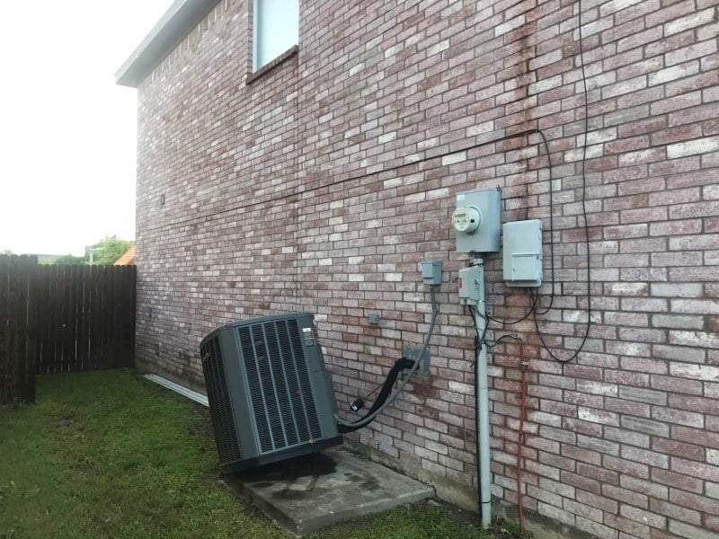 Condensing unit blown off of pad by high winds