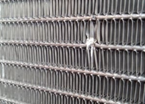 Wind-damaged microchannel coil