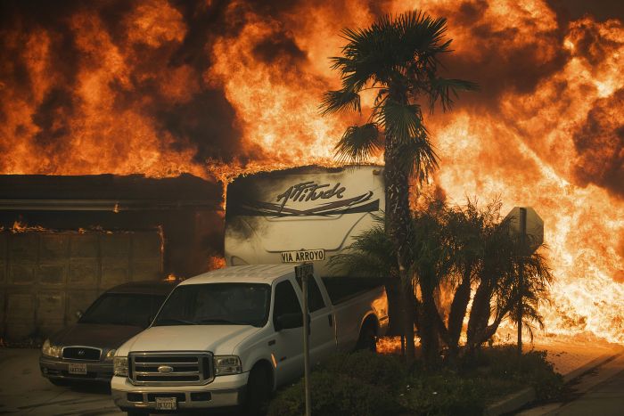 Flames consume a home on Via Arroyo 