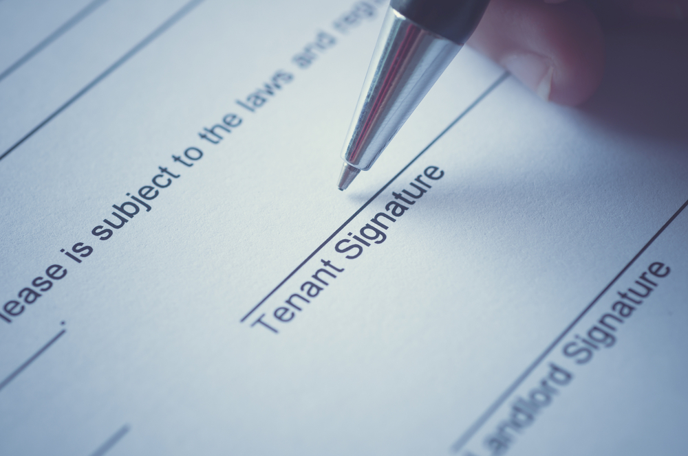 tenant signing a lease agreement