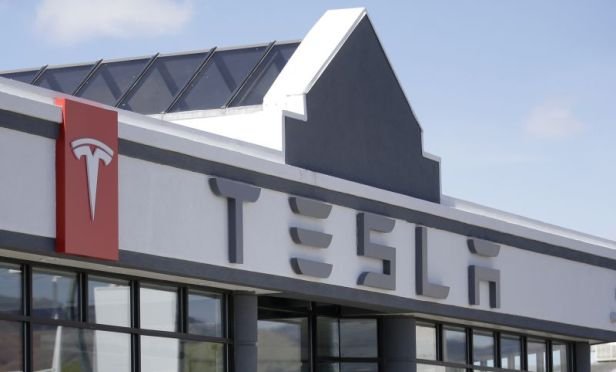 Tesla dealership sign