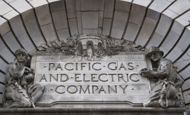 Signage is displayed on the exterior of Pacific Gas and Electric Corp. (PG&E)