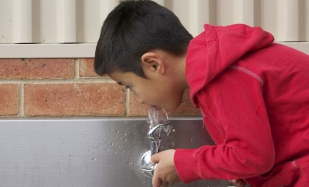 Boy drinking water