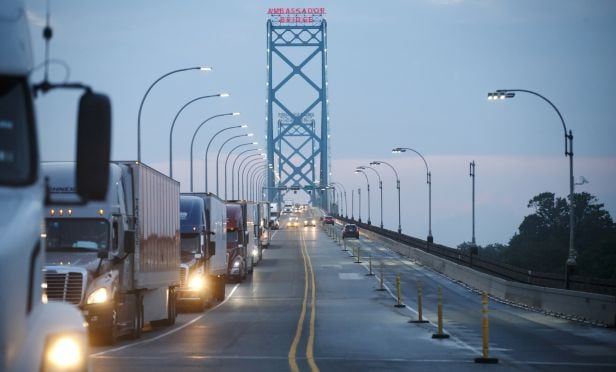 Commercial trucks at border