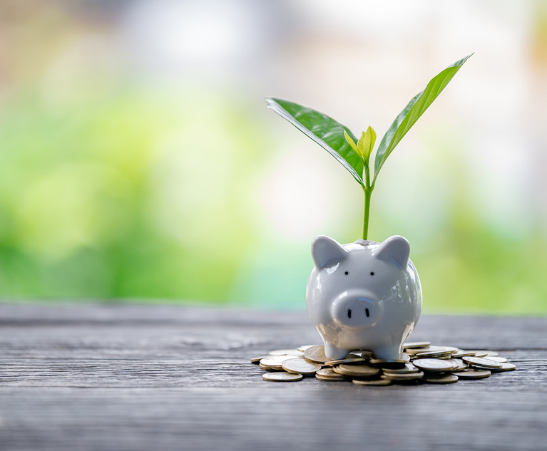 Piggy bank with plant growing out of it. Credit: EKKAPON/Adobe Stock.