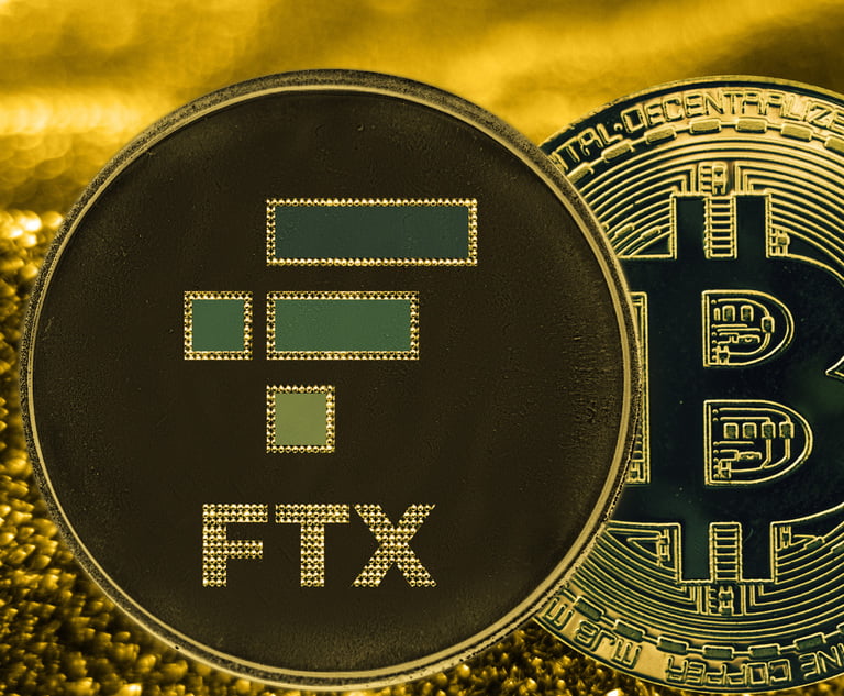 Coin cryptocurrency BTC FTX basic attention token and gold fabric background. Bitcoin logo. Credit: Stanislav/Adobe Stock