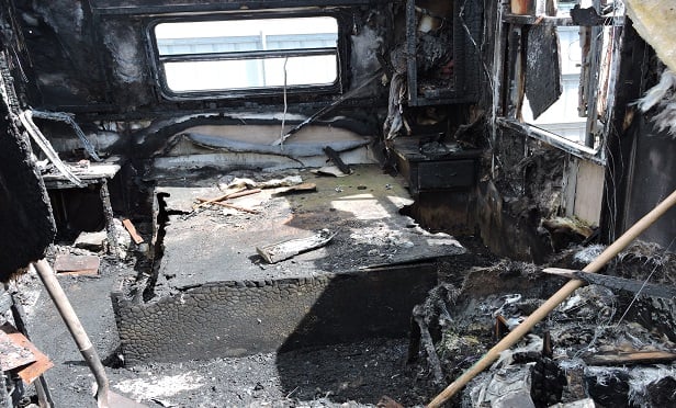 Interior of a burned camper.