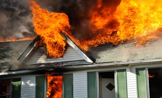 Additional Living Expenses insurance coverage is generally meant to pay for the shortest time required to repair or replace damage from a covered loss such a house fire. (Shutterstock)