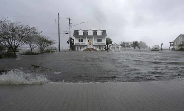 High winds and water surround buildings as Hurricane Florence hits Swansboro, N.C.