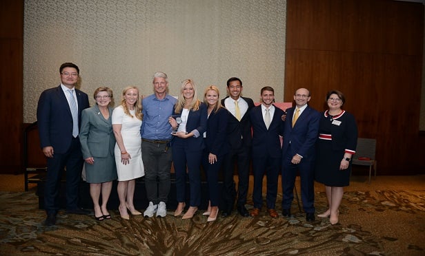 Saint Joseph's University student team pose with executives from RIMS, Spencer and IKEA. (Photo: RIMS)