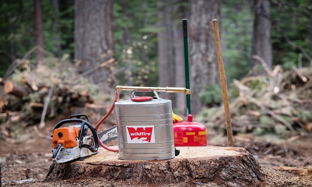 Supplies used by contractors to clear trees away from Pacific Gas & Electric Co. (PG&E) power lines stand on a job site in Nevada City, California, U.S., on Wednesday, June 12, 2019. (Photo: David Paul Morris/Bloomberg)