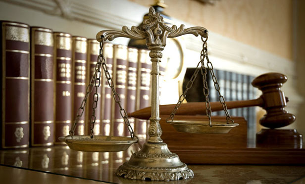 Law-books-with-scales-of-justice-and-gavel