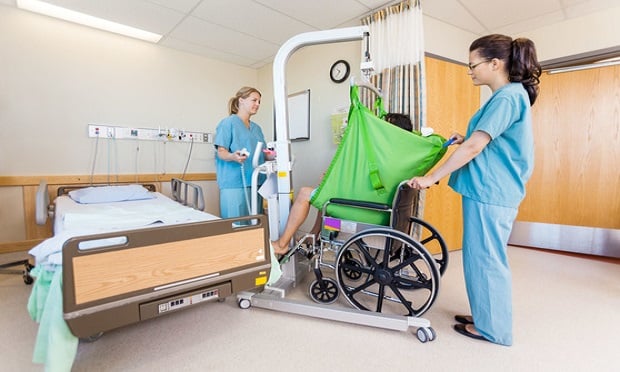 One of the most complicated tasks for nurses and nursing assistants is transferring a patient who is at risk for a fall from a bed to a wheelchair. (Credit: Shutterstock)