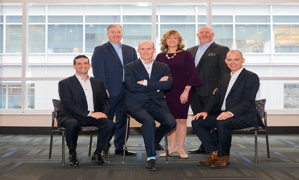 The following are the five new EMC executives, from left to right: Meyer Lehman, executive vice president of finance & chief actuarial officer; Todd Strother, EVP – chief legal officer; Scott Jean, president; Beth Nigut, EVP – chief people officer; Mick Lovell, EVP – chief operating officer; and Eric Faust, EVP – chief synergy officer. (Photo: EMC Insurance) 