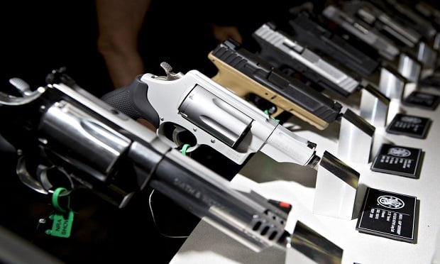 Pistols and revolvers sit on display in the Smith & Wesson Corp. booth during the National Rifle Association (NRA) annual meeting in Dallas, Texas, U.S., on Saturday, May 5, 2018. (Photo: Bloomberg)