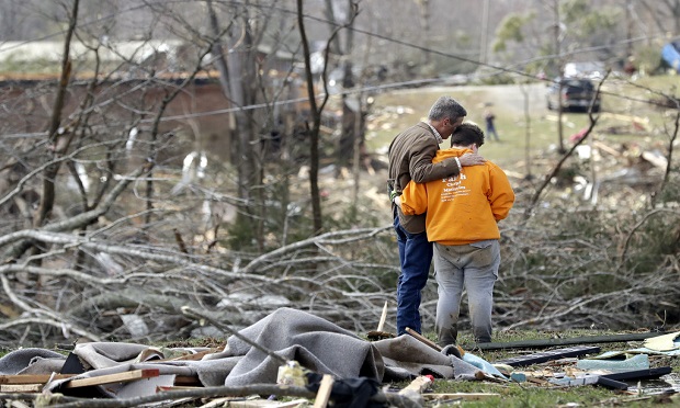 Tornadoes ripped across Tennessee early March. The storms shredded buildings and buried people in piles of rubble. (AP Photo/Mark Humphrey)