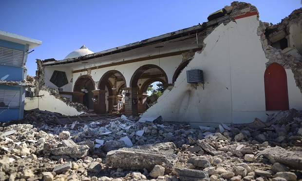 The Immaculate Concepcion Catholic church lies in ruins after an overnight earthquake in Guayanilla, Puerto Rico, Tuesday, Jan. 7, 2020. A 6.4-magnitude earthquake struck Puerto Rico before dawn on Tuesday, killing one man, injuring others and collapsing buildings in the southern part of the island. (AP Photo/Carlos Giusti)