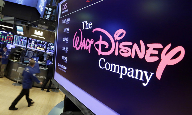 The Walt Disney Co. logo appears on a screen above the floor of the New York Stock Exchange. (Photo: AP Photo/Richard Drew)