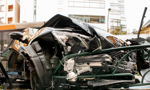 The lawsuit stemmed from a single-vehicle crash that left two teenager passengers severely injured after a nonparty minor took a curve too fast and rolled the car. The vehicle was insured by Progressive and premiums were paid for both liability and uninsured motorist coverage in the amount of $100,000 per person, with a $300,000 limit per accident. (Credit: Caito/Adobe Stock) 