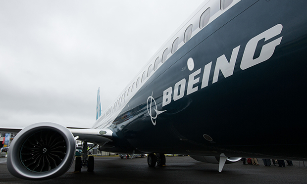 The deal also requires the Boeing board have more directors with a background in aerospace or safety oversight, a shortcoming while the 737 Max was being certified. The company agreed to add a director with that expertise within a year and ensure at least three directors are similarly qualified. (Credit: Luke MacGregor/Bloomberg)
