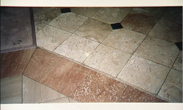 Moisture staining on a granite floor.