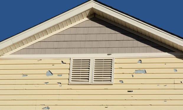 This week’s question explores when exclusions apply to wind-damaged exteriors. (Credit: Merrimon Crawford/Shutterstock.com)